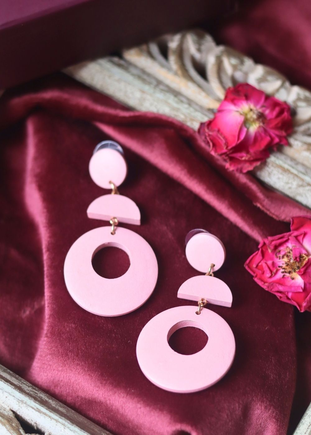 Dangling Pink Earrings with dashing pink color