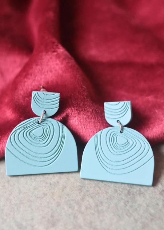 Serene Teal Earrings made by plastic
